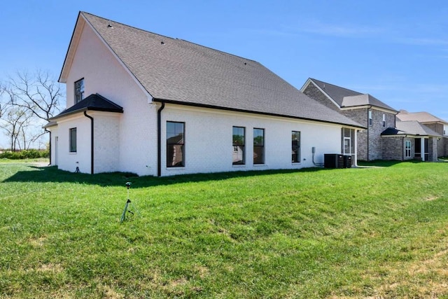 919 Licinius Ln, Murfreesboro, TN 37128 - back of property with central AC unit and a lawn