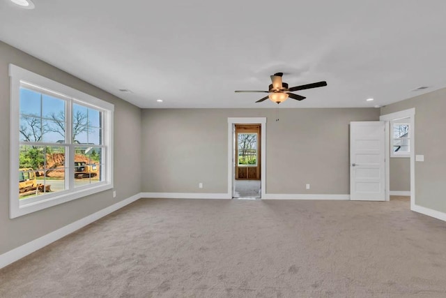 919 Licinius Ln, Murfreesboro, TN 37128 - carpeted spare room featuring a healthy amount of sunlight, ceiling fan, baseboards, and recessed lighting