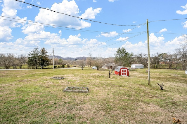 view of yard with a shed and an outdoor structure