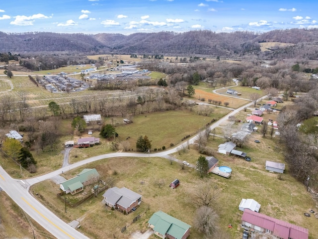 aerial view featuring a rural view and a mountain view