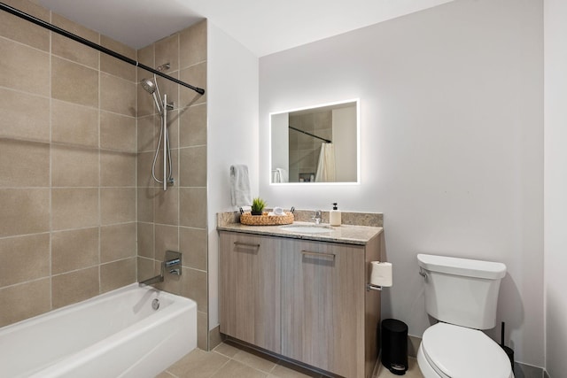 bathroom with tile patterned flooring, vanity, toilet, and shower / bath combo