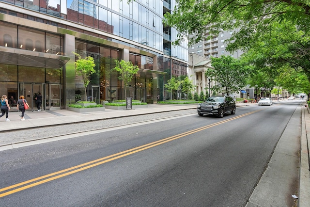 view of street featuring sidewalks and curbs