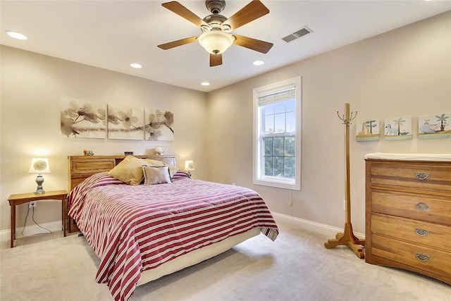 bedroom featuring recessed lighting, visible vents, baseboards, and light colored carpet