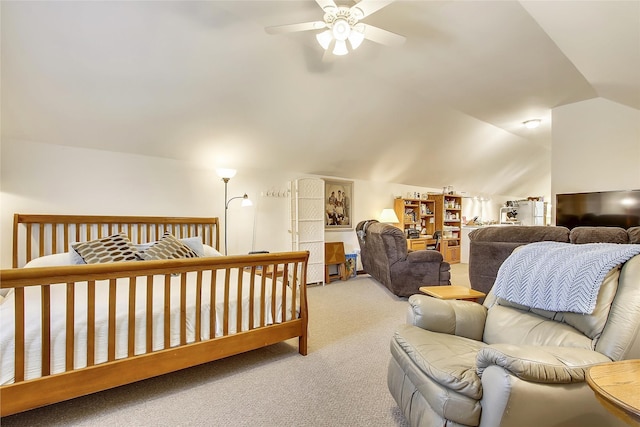 bedroom with a ceiling fan, carpet flooring, and vaulted ceiling