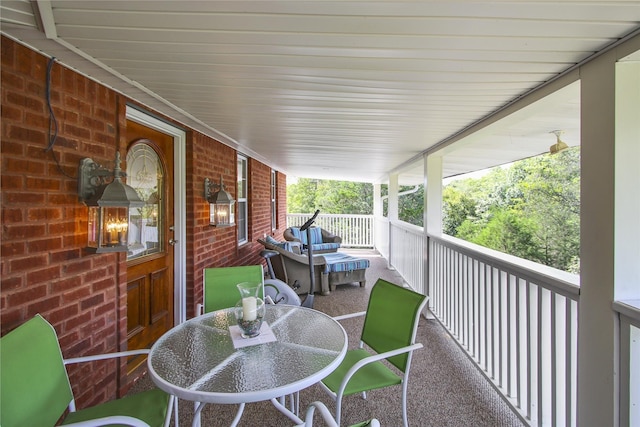 view of patio featuring a porch