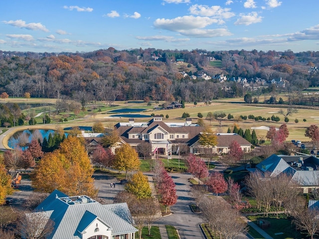 birds eye view of property with a residential view