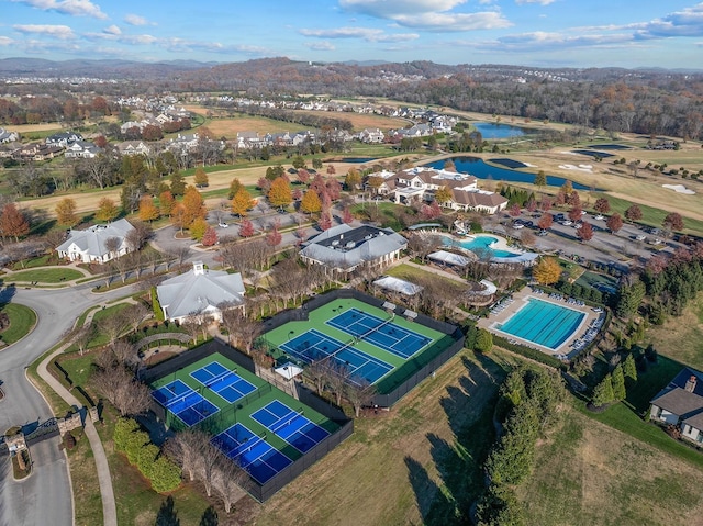 bird's eye view with a water view and a residential view