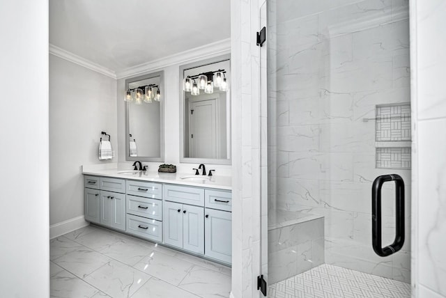 bathroom with double vanity, a marble finish shower, marble finish floor, crown molding, and a sink