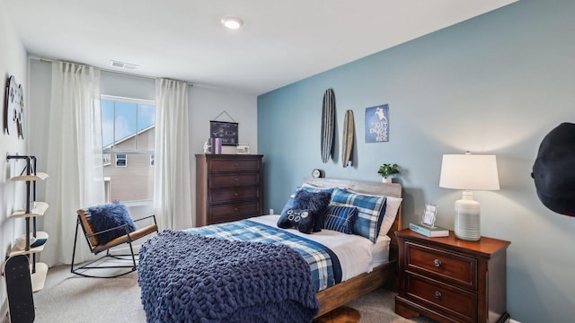 bedroom featuring carpet and visible vents