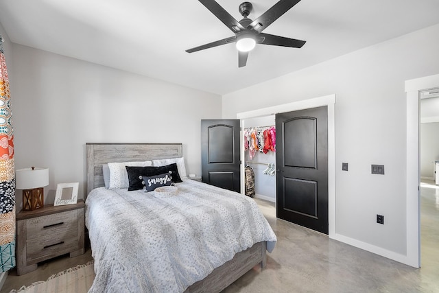 bedroom with ceiling fan, finished concrete flooring, and baseboards