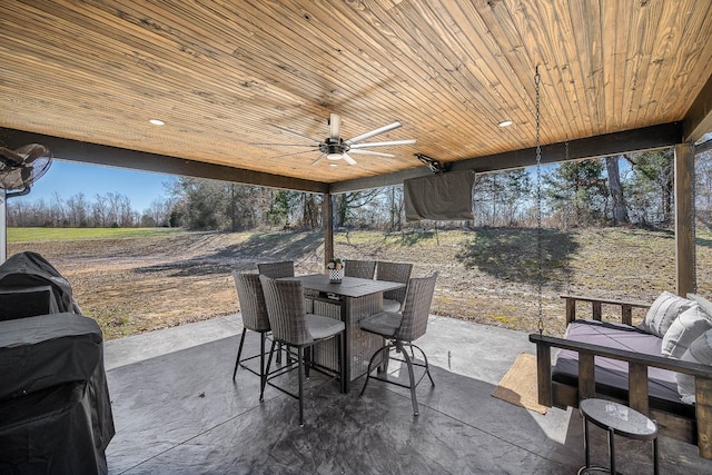 view of patio / terrace with outdoor dining area and ceiling fan