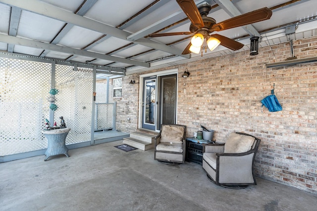 view of patio featuring entry steps and ceiling fan