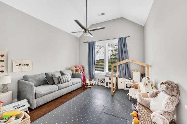 living room with visible vents, vaulted ceiling, and a ceiling fan