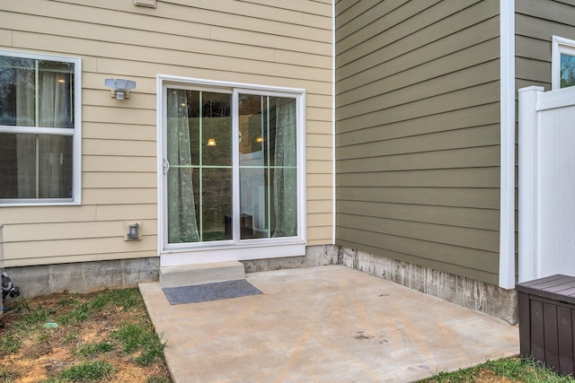 doorway to property featuring a patio