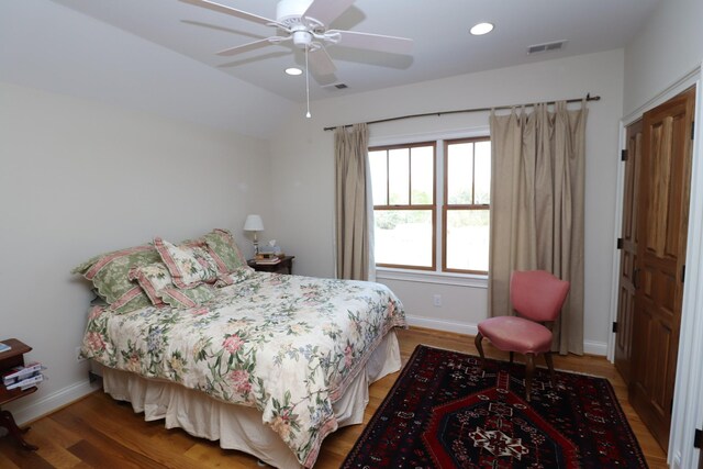 bedroom with recessed lighting, visible vents, baseboards, and light wood finished floors