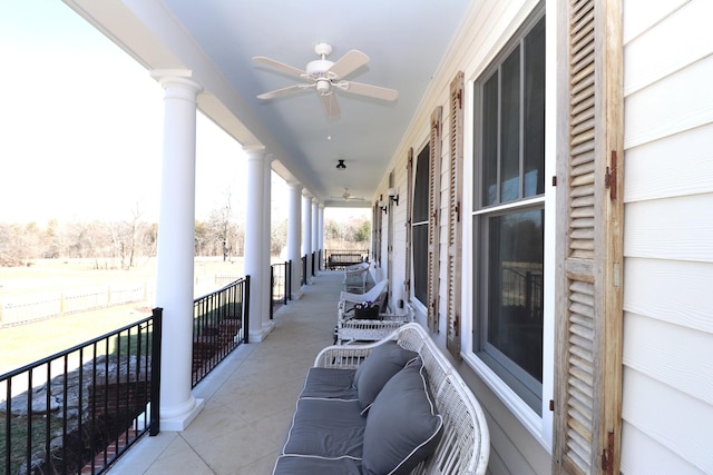 balcony with a ceiling fan