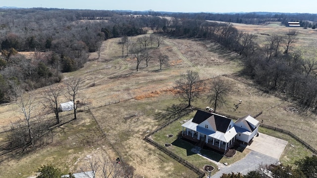 aerial view with a rural view and a view of trees