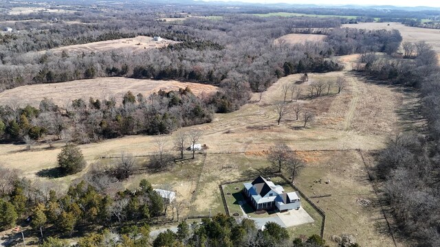 aerial view featuring a rural view and a forest view