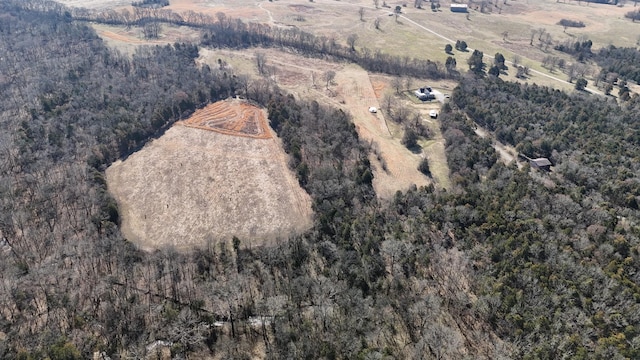 aerial view featuring a view of trees