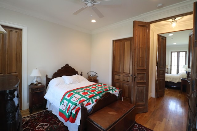 bedroom with recessed lighting, wood finished floors, crown molding, and ceiling fan