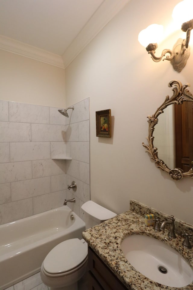 bathroom featuring washtub / shower combination, toilet, vanity, and ornamental molding