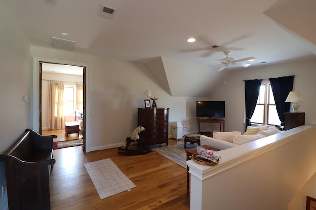 living room with recessed lighting, wood finished floors, visible vents, and ceiling fan