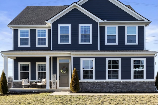 craftsman-style house featuring covered porch