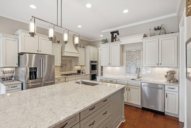 kitchen featuring stainless steel appliances, dark wood-type flooring, a sink, ornamental molding, and light stone countertops