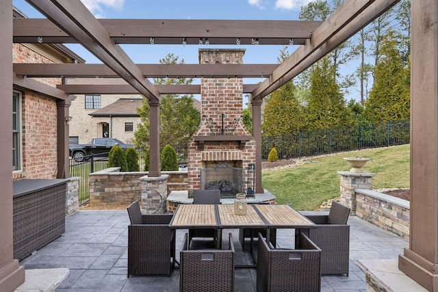 view of patio / terrace with an outdoor brick fireplace, outdoor dining space, fence, and a pergola