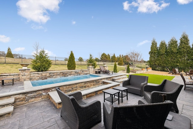 view of patio / terrace featuring fence and an outdoor hangout area