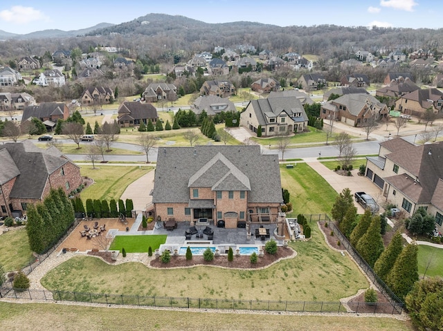 aerial view with a mountain view and a residential view