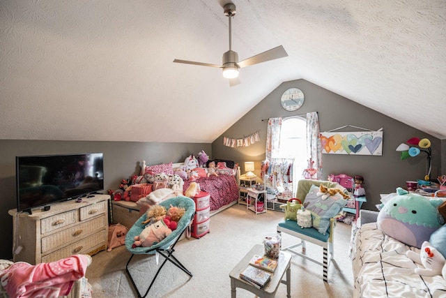 bedroom with a textured ceiling, carpet, lofted ceiling, and a ceiling fan