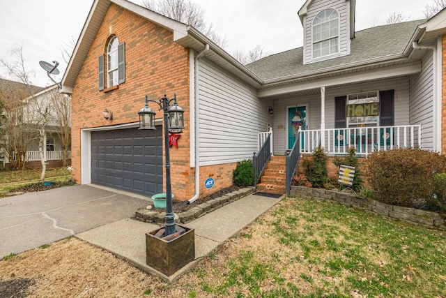 view of front of property featuring a porch, an attached garage, brick siding, a shingled roof, and concrete driveway