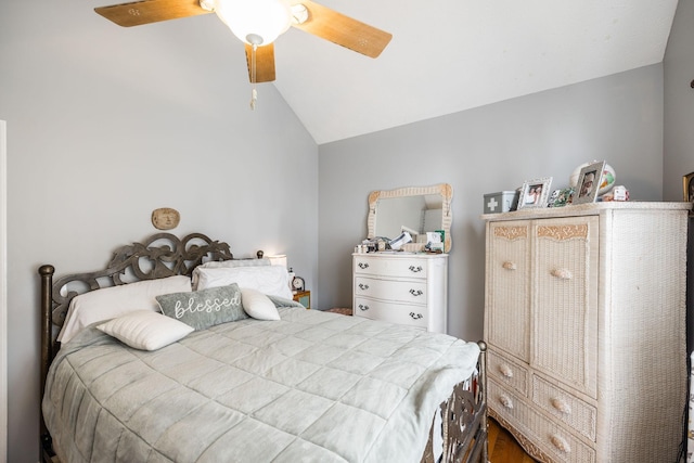 bedroom featuring lofted ceiling and ceiling fan