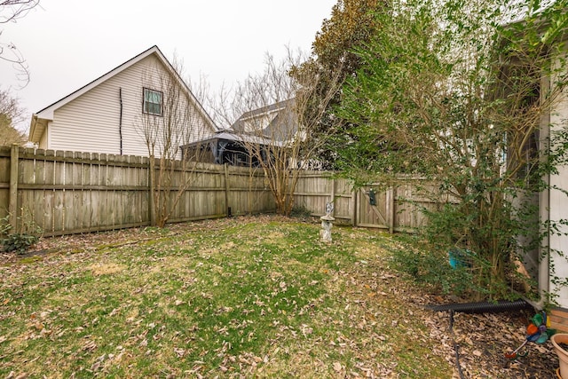 view of yard featuring a fenced backyard