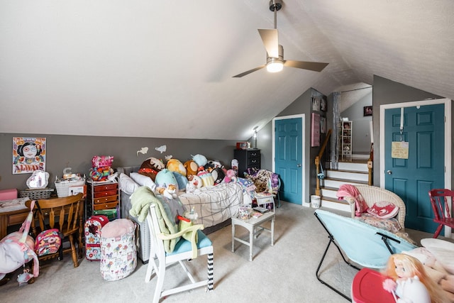 bonus room featuring vaulted ceiling, carpet, stairs, and a ceiling fan