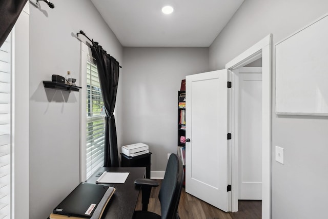 home office with wood finished floors