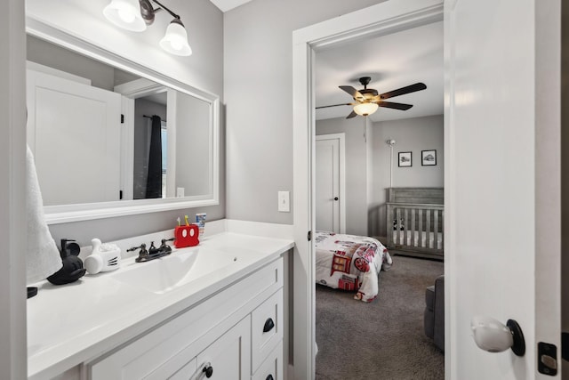 bathroom featuring vanity and a ceiling fan