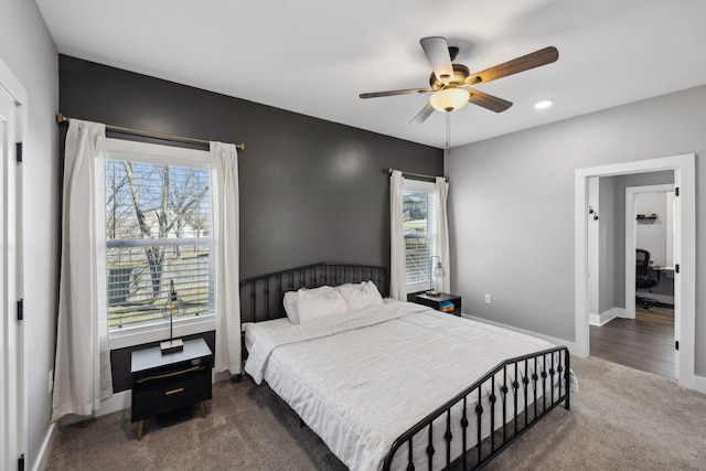bedroom featuring carpet flooring, a ceiling fan, and baseboards