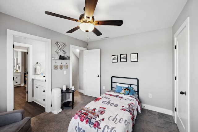 bedroom with visible vents, baseboards, ceiling fan, and dark carpet