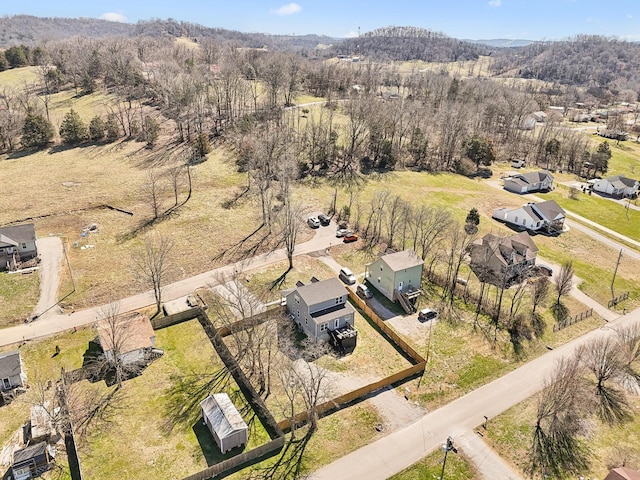 aerial view featuring a view of trees