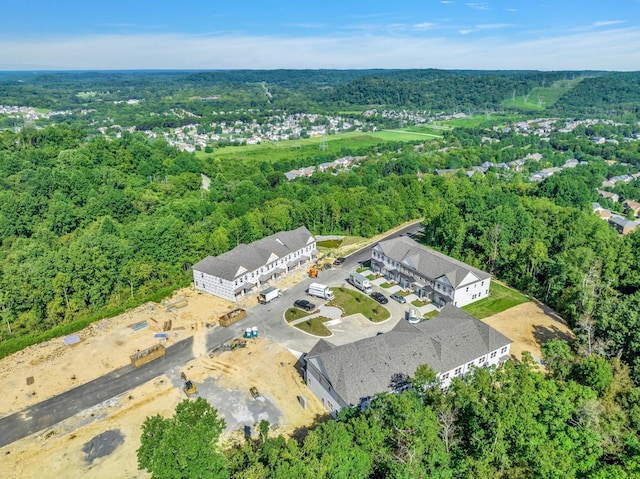 aerial view with a wooded view