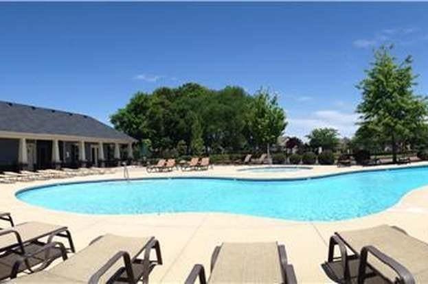 pool with a patio area