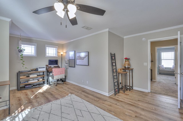 home office with baseboards, wood finished floors, a ceiling fan, and ornamental molding