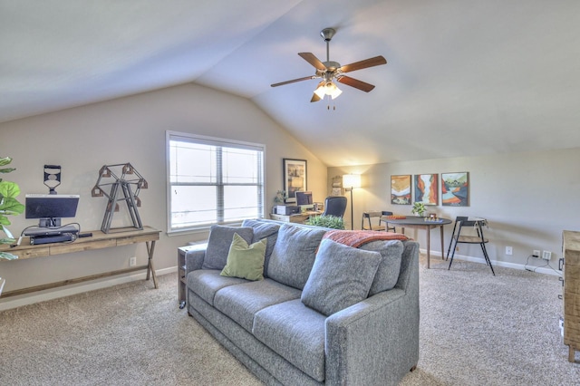 carpeted living room with vaulted ceiling, a ceiling fan, and baseboards