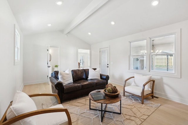 living area with lofted ceiling with beams, light wood-style floors, a wealth of natural light, and recessed lighting