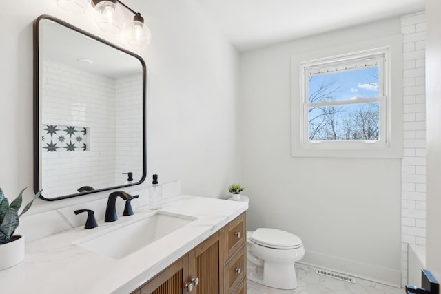 full bathroom featuring baseboards, visible vents, toilet, marble finish floor, and vanity