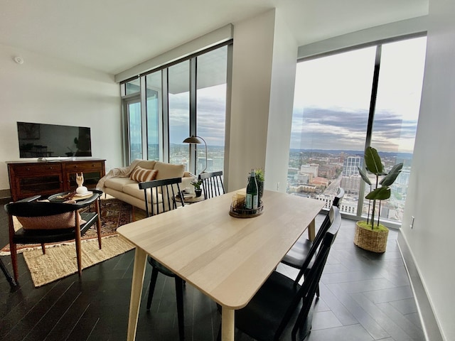 dining space featuring baseboards