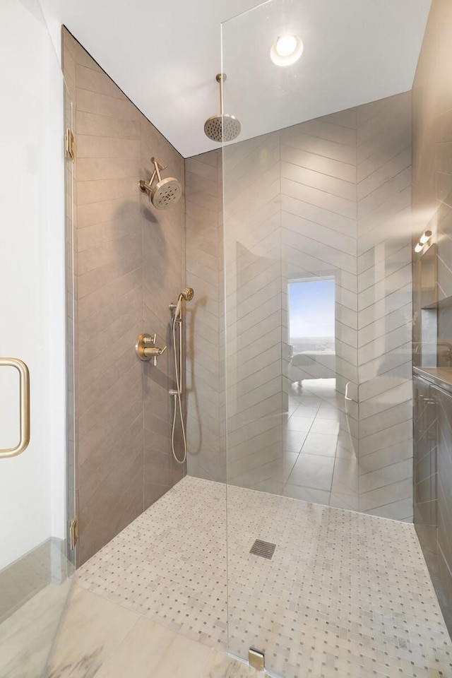 full bathroom featuring a shower stall