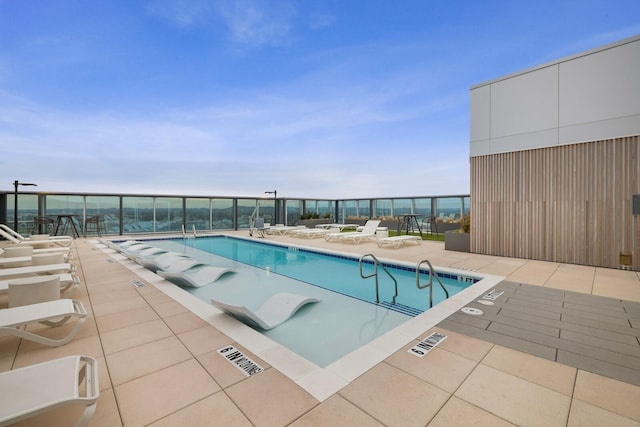 pool with a patio